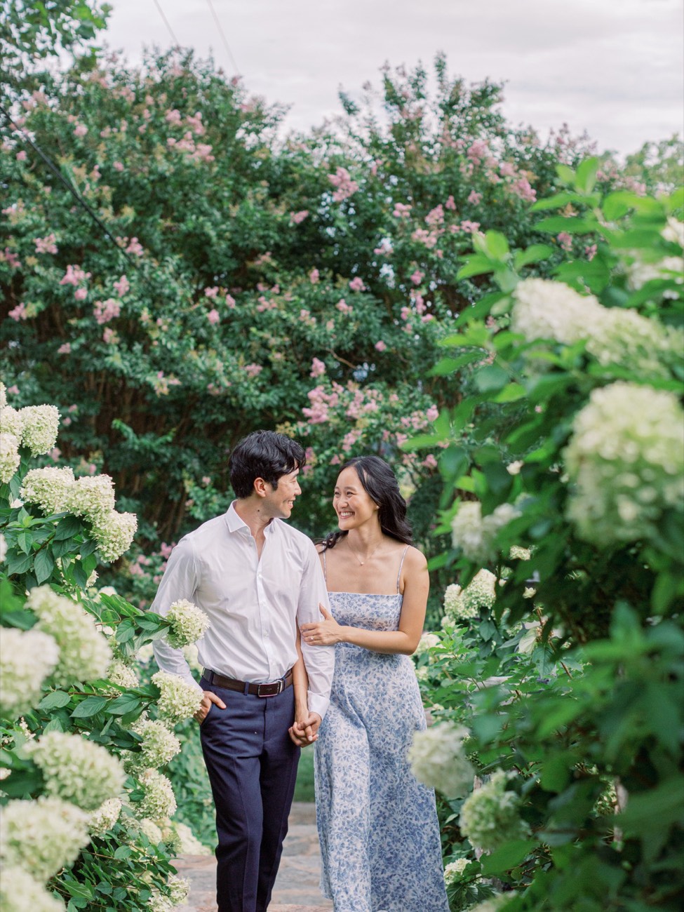 Christina and Erik walking through the garden